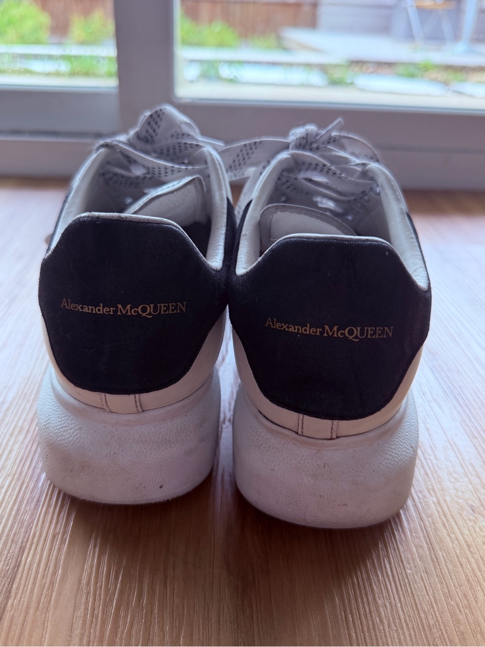 Alexander McQueen White Sneakers with Black Heel and Gold Logo